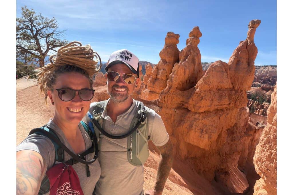 couple in front of hoodoos, Bryce Canyon Queen's Garden
